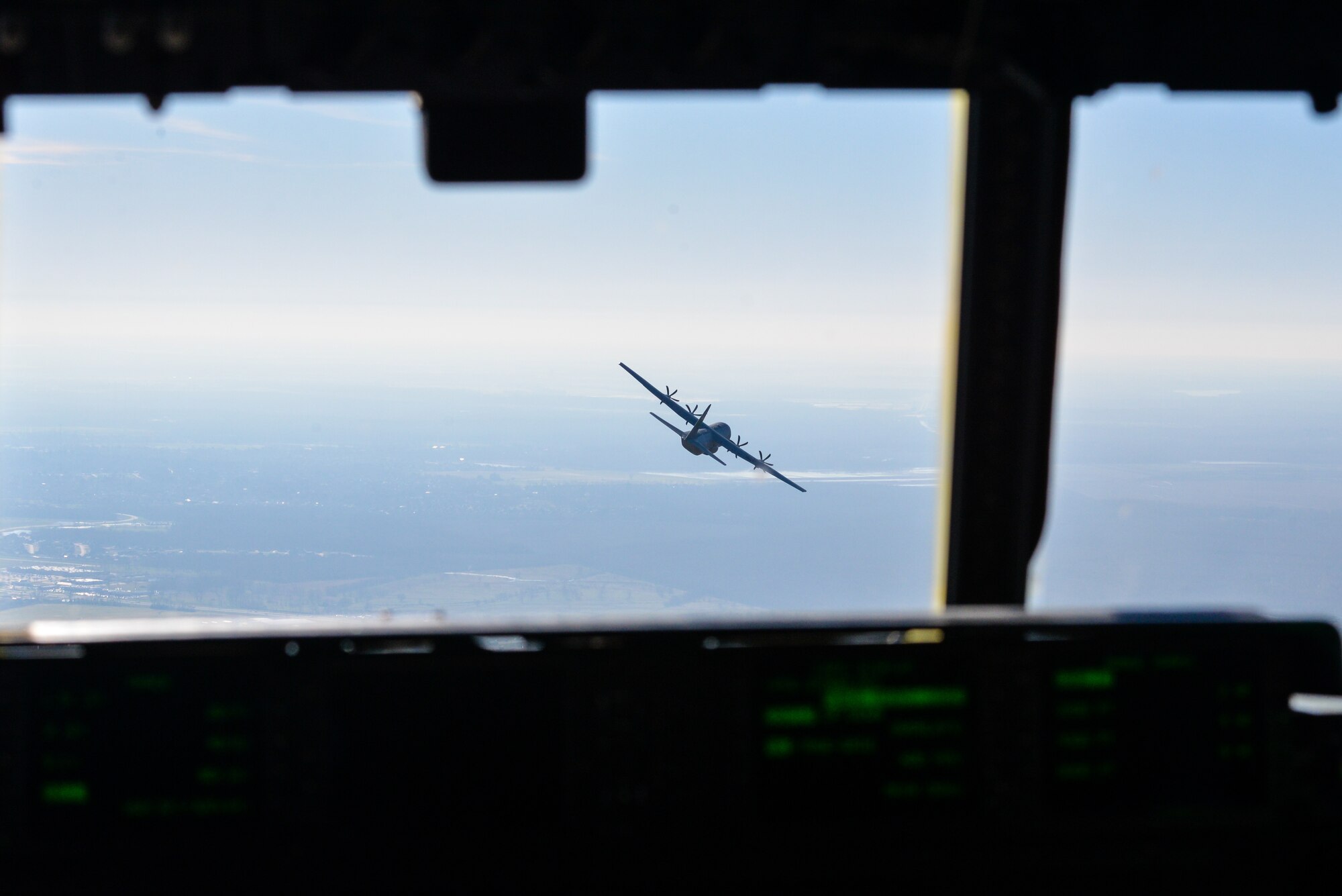 An airplane flies ahead