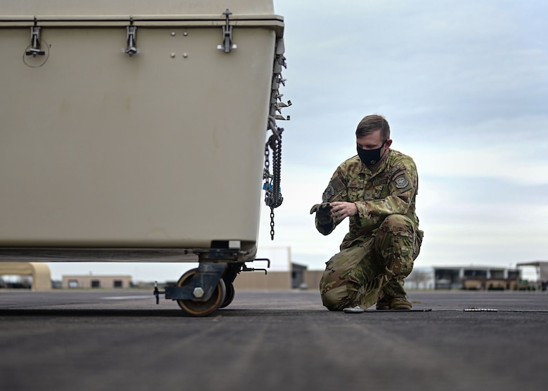 A person loads cargo