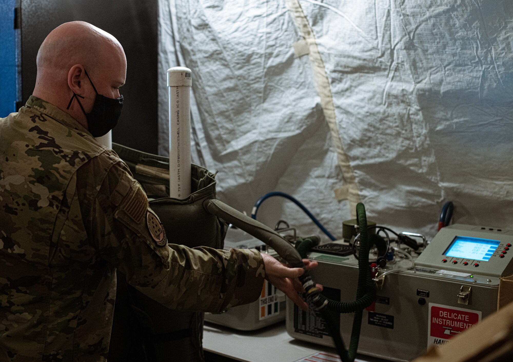 Airmen from the 378th Expeditionary Fighter Squadron aircrew flight equipment perform maintenance on equipment Feb. 11, 2021, at Prince Sultan Air Base, Kingdom of Saudi Arabia.