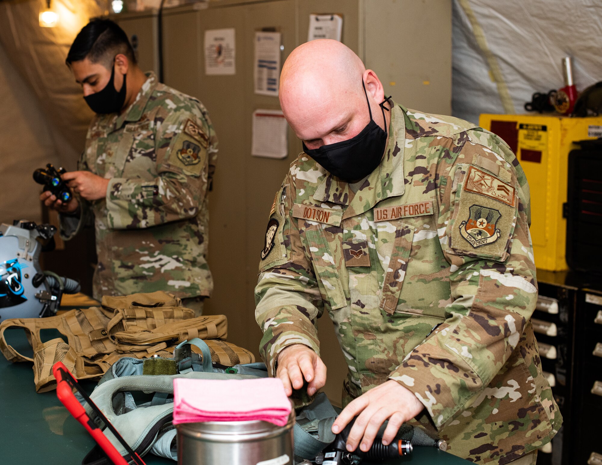Airmen from the 378th Expeditionary Fighter Squadron aircrew flight equipment perform maintenance on equipment Feb. 11, 2021, at Prince Sultan Air Base, Kingdom of Saudi Arabia.