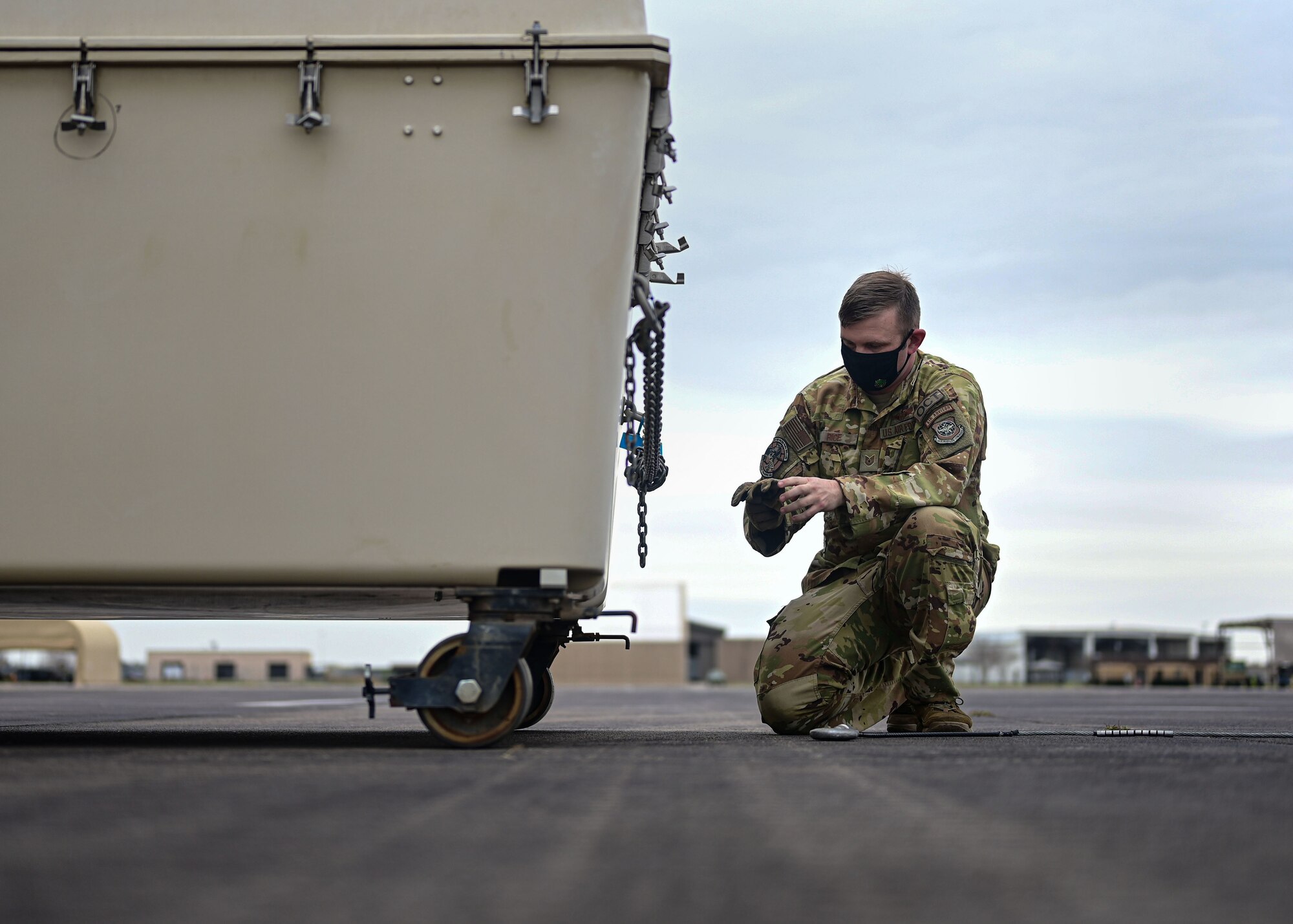 A person loads cargo