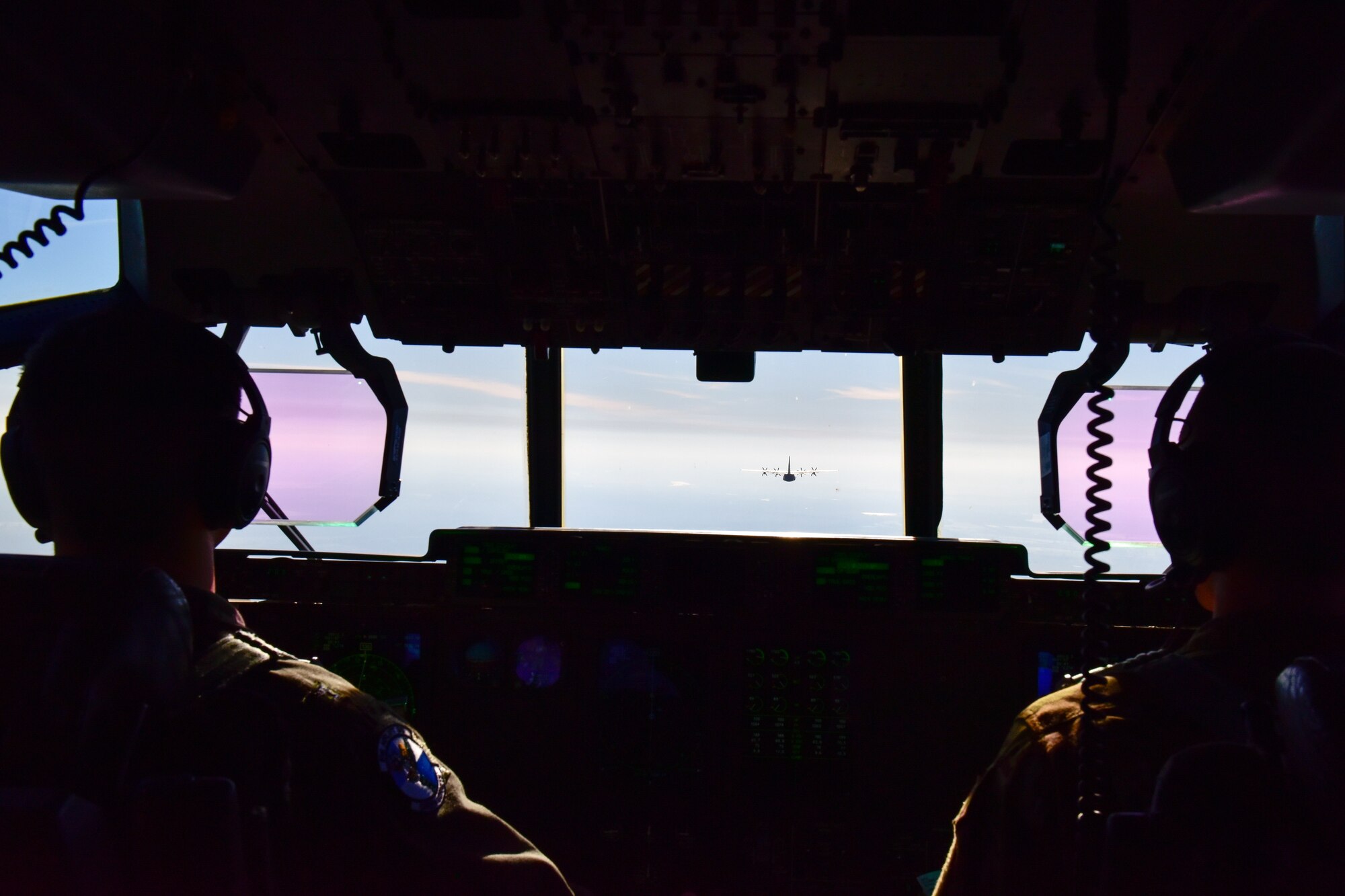 Pilots fly a plane