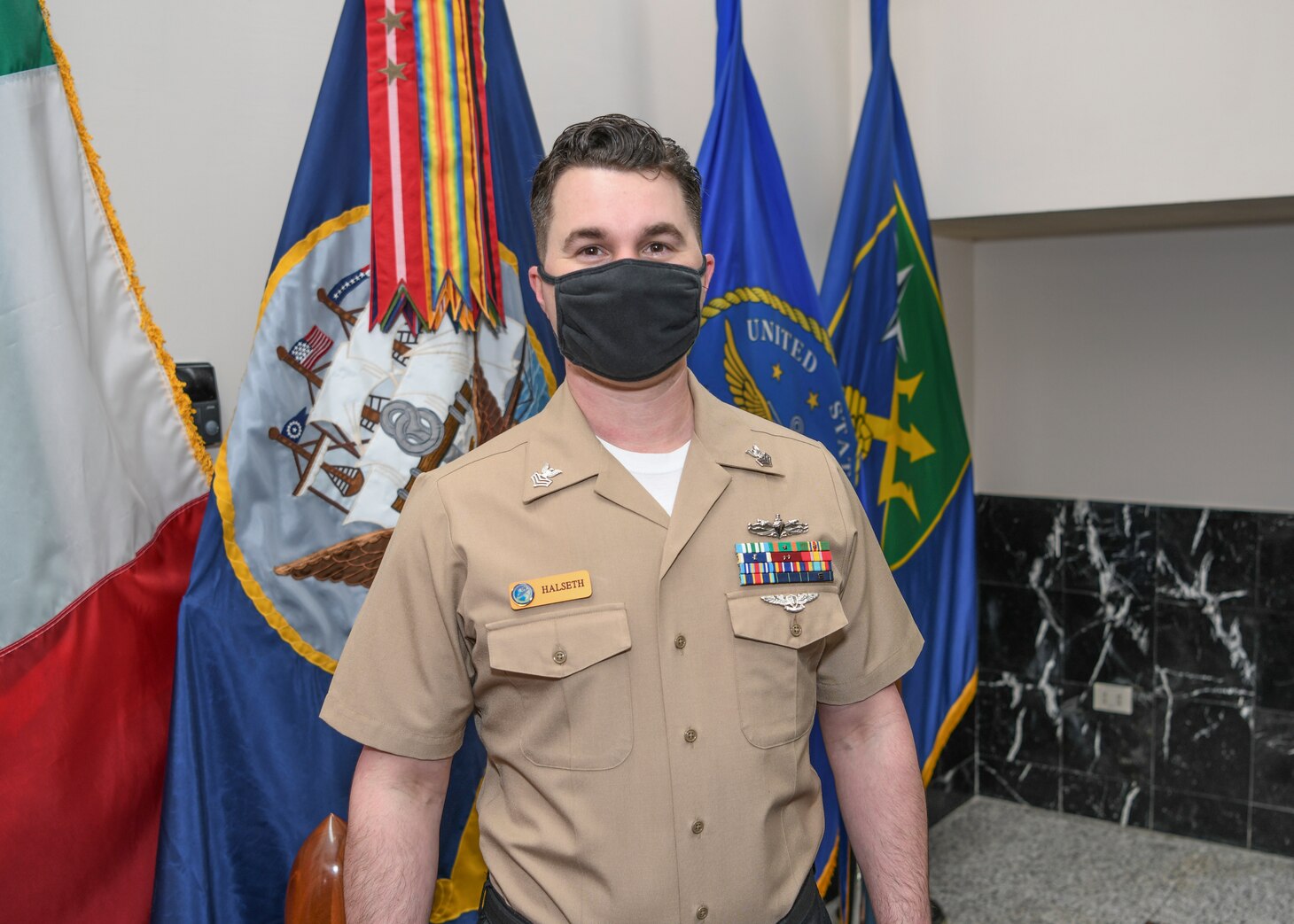 210216-N-EF478-0002 NAVAL SUPPORT ACTIVITY NAPLES, Italy (Feb. 16, 2021) Electronics Technician 1st Class Luke Halseth poses for a portrait, Feb. 16, 2021. U.S. Naval Forces Europe and Africa, headquartered in Naples, Italy, conducts the full spectrum of joint and naval operations, often in concert with allied and interagency partners, in order to advance U.S. national interests and security and stability in Europe and Africa. (U.S. Navy photo by Mass Communication Specialist 1st Class Marvin Thompson/ Released)
