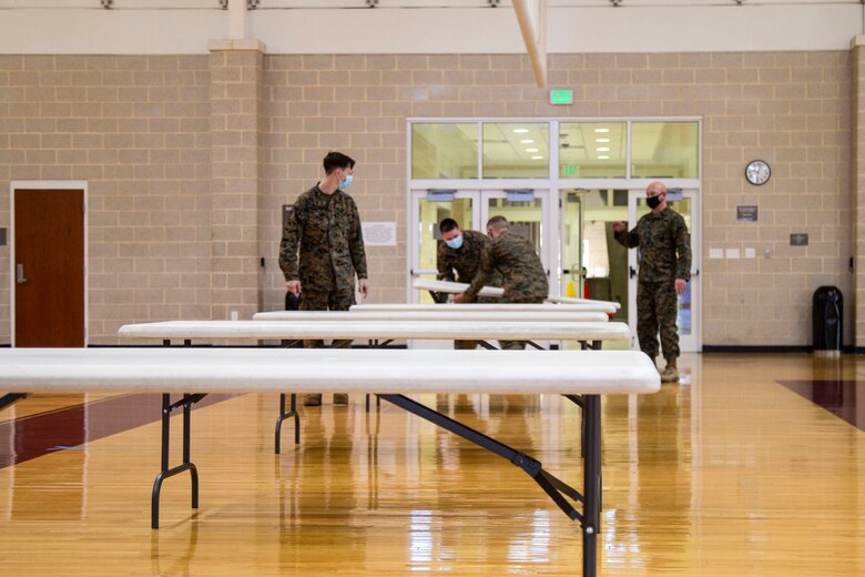 An additional mass vaccination site is being set up at the Wallace Creek Fitness Center to enable Naval Medical Center Camp Lejeune personnel to vaccinate the base population against COVID-19 more rapidly. The new location will serve as an additional site to accommodate base personnel, TRICARE  beneficiaries and commands not associated with II Marine Expeditionary Force. A date of opening has not yet been announced as NMCCL crews are working to establish operations at the new site. (U.S. Marine Corps photo by Cpl. Ginnie Lee)