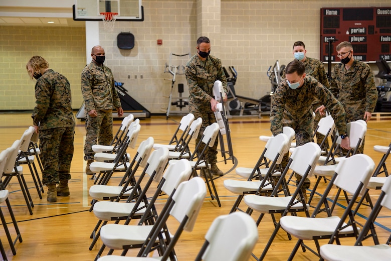 An additional mass vaccination site is being set up at the Wallace Creek Fitness Center to enable Naval Medical Center Camp Lejeune personnel to vaccinate the base population against COVID-19 more rapidly. The new location will serve as an additional site to accommodate base personnel, TRICARE  beneficiaries and commands not associated with II Marine Expeditionary Force. A date of opening has not yet been announced as NMCCL crews are working to establish operations at the new site. (U.S. Marine Corps photo by Cpl. Ginnie Lee)