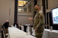 Task Force Northeast Commanding General Maj. Gen. Jeff Van speaks to members of the Urban Augmentation Medical Task Force-531, based out of Fort Campbell, Ky., during a joint reception, staging, onward movement, and integration brief in New Jersey in support of COVID-19 vaccine operations.
