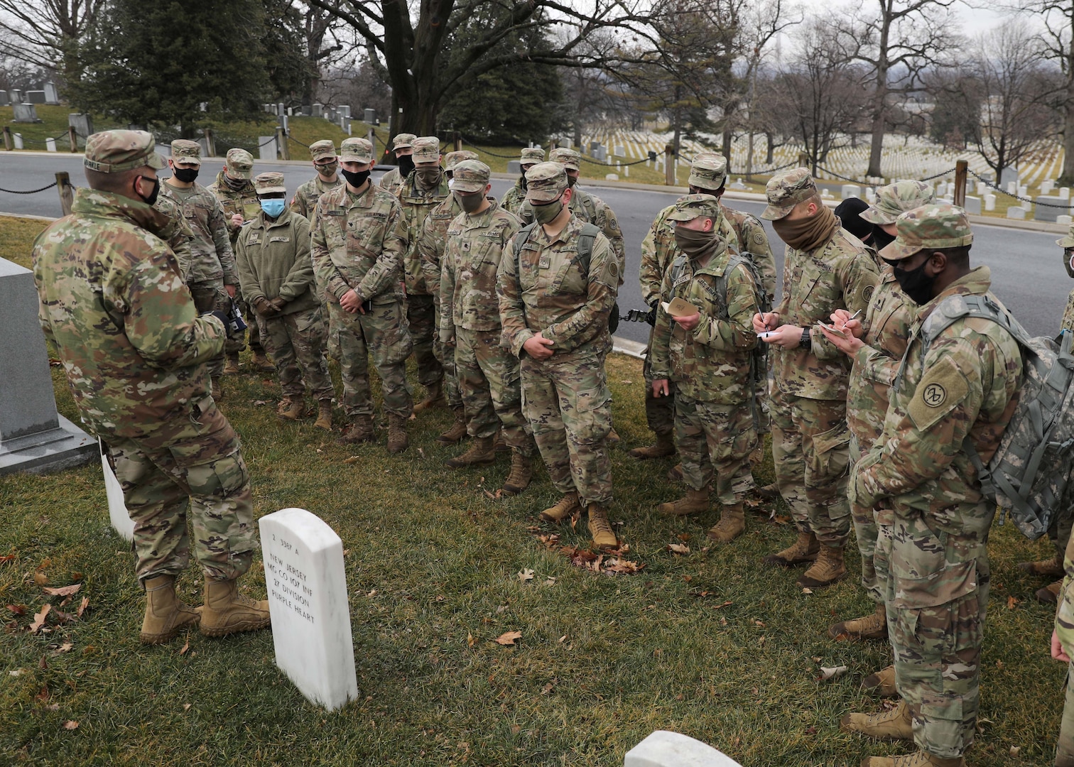 U.S. Soldiers with the 27th Infantry Brigade Combat Team, 42nd Infantry Division, New York National Guard, learn about the history and heroic actions of Medal of Honor recipient Sgt. Alan L. Eggers during a visit to Arlington National Cemetery in Arlington, Va., Feb. 14, 2021. Eggers, a World War I veteran of the New York National Guard’s 27th Infantry Division, received the Medal of Honor with two other Soldiers for their heroic actions in combat near Le Catelet, France, Sept. 29, 2018.