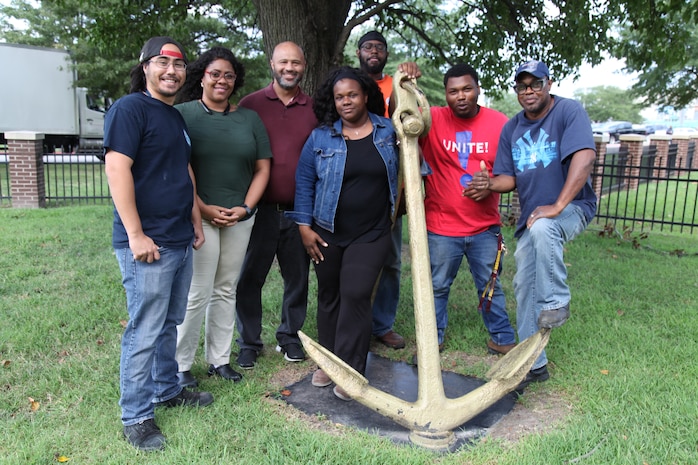 Code 700 members Christopher Curtis, Jennifer Freeman, Marcel Lane, Tia Hudgins Reid, Christopher Leonard, Devonte Evans, Eli Ward III.  Together they acquired Norfolk Naval Shipyard’s acquirement of its first laser ablation machine in 2018.