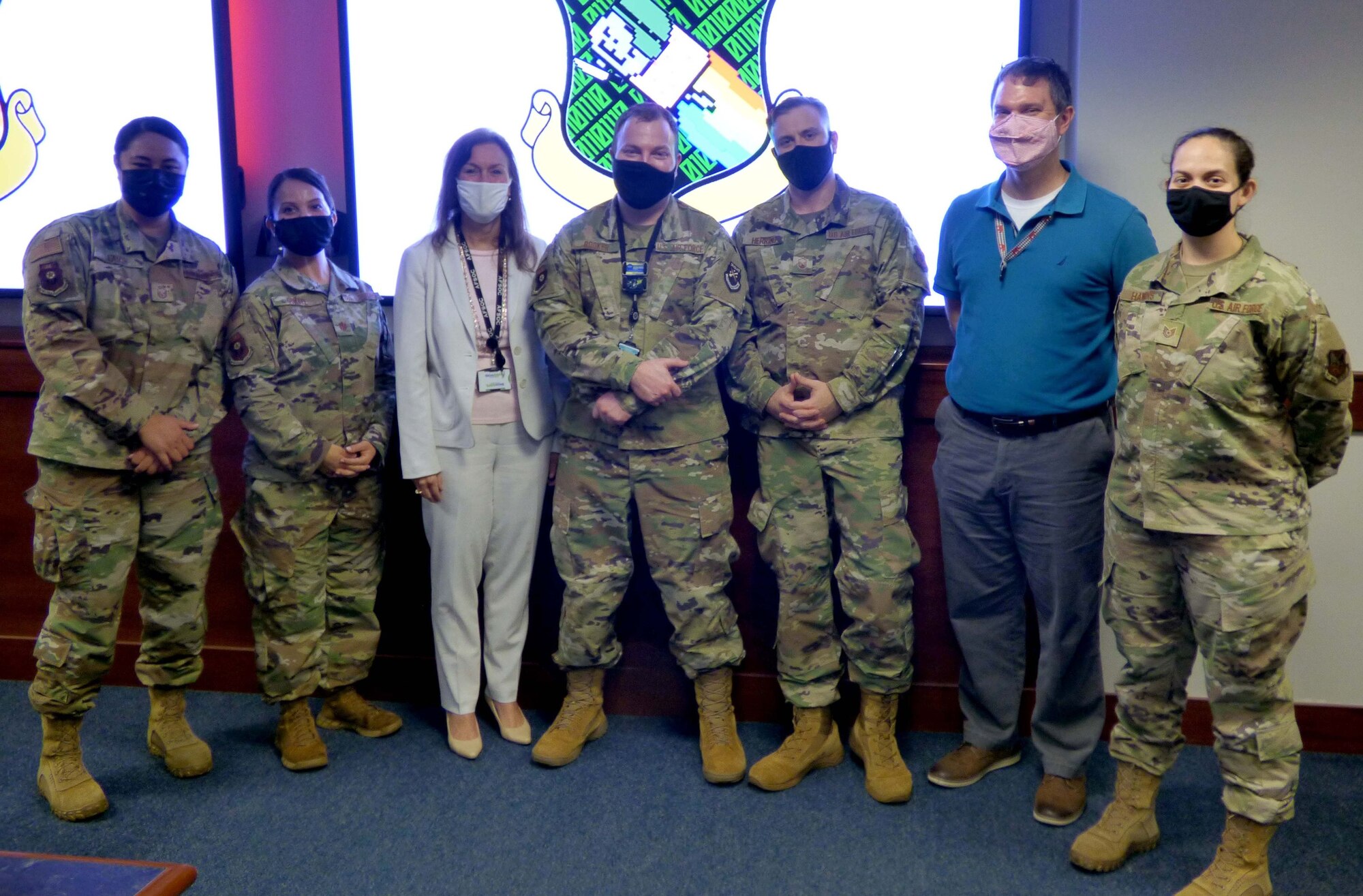 Organizers of Air Force Special Operations Command's Mission Defense Conference pose for a photo at Hurlburt Field, Fla., Feb. 5, 2021. The conference focused on identifying the organic cyber capabilities needed to protect missions against threats in, through, and from cyberspace. (Courtesy Photo)