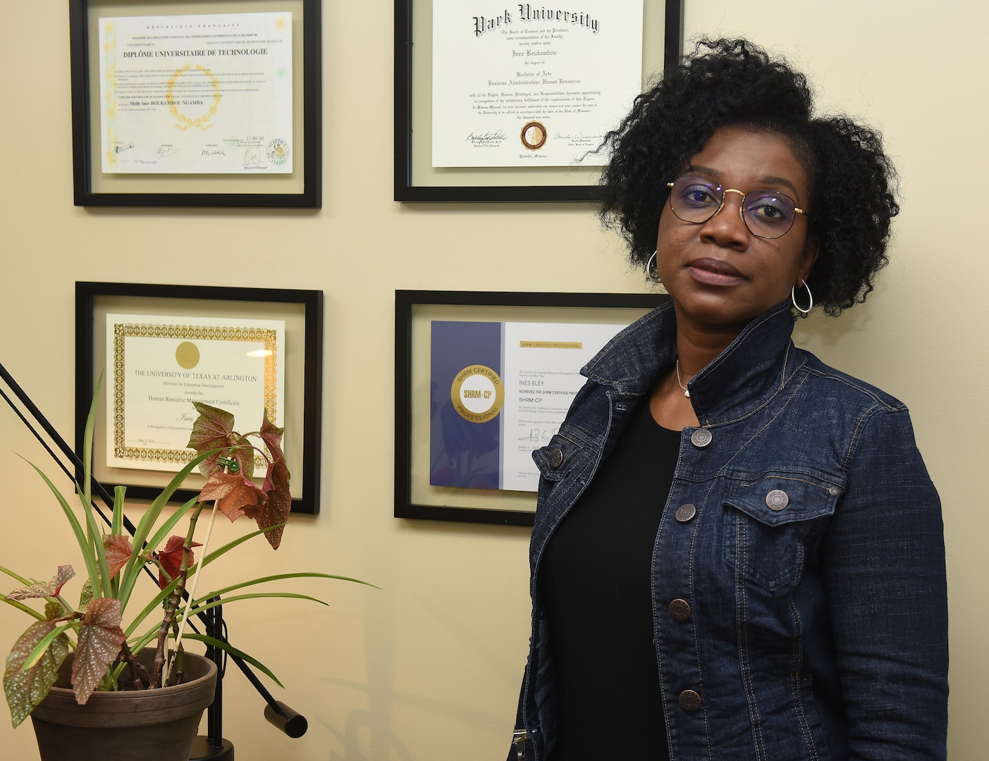 Ines Eley, a human resources specialist at Camp Johnson, Vermont, is a native of Brazzaville, Republic of Congo, who recently joined the Vermont National Guard in a civilian capacity. She speaks English, French, German, three Congolese dialects, and Wolof, the most common Senegalese dialect. She became a citizen on July 19, 2012. She is pictured in the Vermont National Guard Human Resources Office Feb. 17, 2021. (U.S. Army National Guard photo by Don Branum)