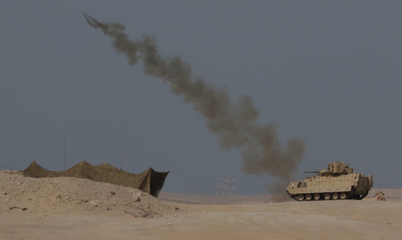 A U.S. Army M1150 Assault Breacher Vehicle from 1st Battalion, 6th Infantry Regiment, 2nd Brigade Combat Team, 1st Armored Division, launches its Linear Demolition Charge System during a live-fire exercise portion of Iron Union 14 at Al Hamra Training Center in the United Arab Emirates, Feb. 4, 2021. Iron Union is a recurring, bilateral exercise that is designed for U.S. forces to train with UAE counterparts in addressing common threats to regional security in Southwest Asia. (U.S. Army photo by Staff Sgt. Daryl Bradford, Task Force Spartan Public Affairs)