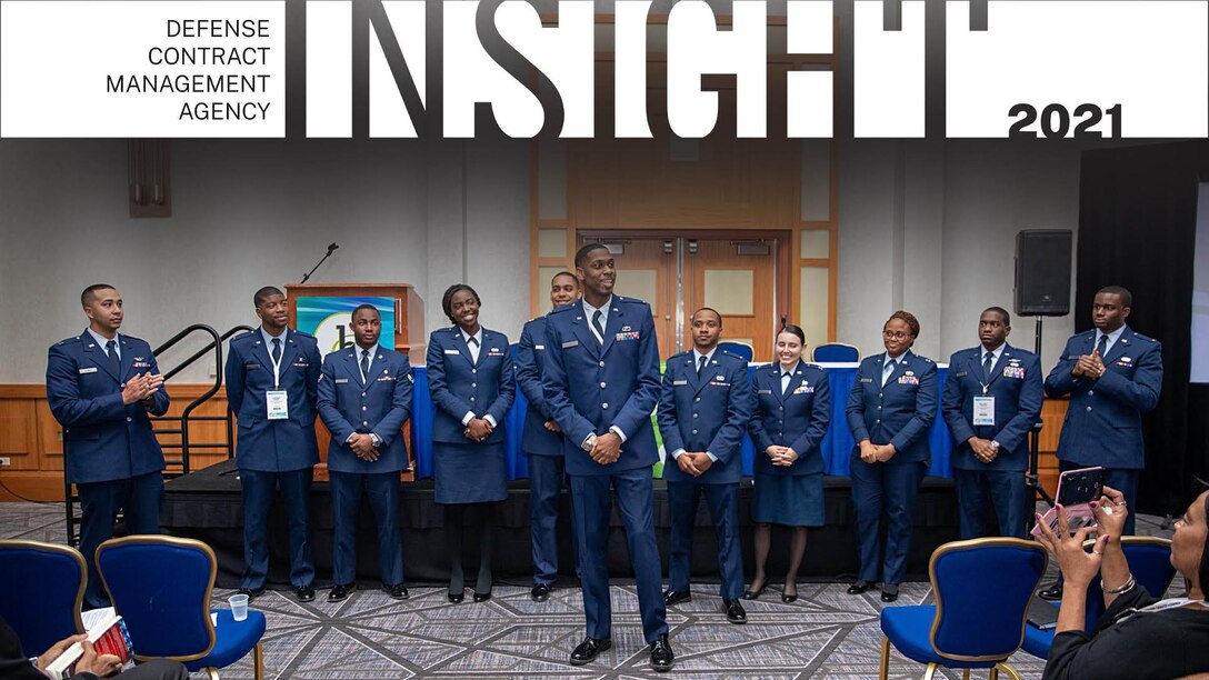 Air Force officer speaks with event crowd.