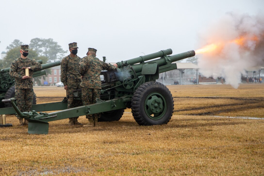 U.S. Marines with Fox Battery, 2nd Battalion, 10th Marine Regiment, 2d Marine Division, fire 155mm blank rounds for a 21-gun salute during a Presidents Day ceremony on Camp Lejeune, N.C., Feb. 15, 2021. Presidents Day originally celebrated U.S. Presidents George Washington and Abraham Lincoln’s birthdays, it now honors past president’s lives and birthdays. (U.S. Marine Corps photo by Pfc. Sarah Hediger)