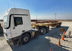 Pieces of excess building materials arrive at the DLA Disposition Services site at Bagram, Afghanistan.