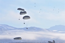 Photo of paratroopers dropping into the Donnelley Training Area, Alaska.