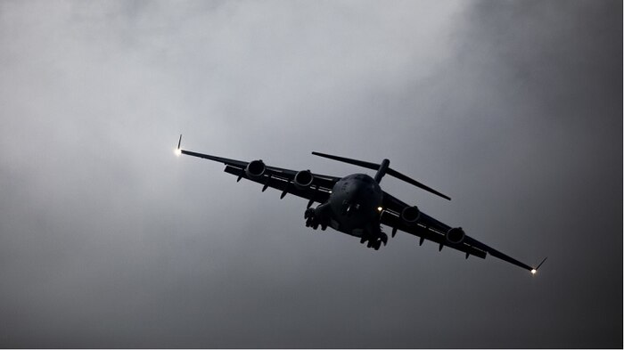 Mighty Mice: Globemasters fly over MCAS Kaneohe Bay