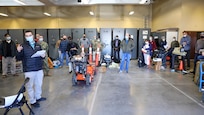 U.S. Air Force Maj. Ryan Crean, the Forward Command Element (FCE) convoy commander assigned to Task Force Northeast (TF-NE), gives FCE and Incident Support Team members a convoy brief before departing TF-NE headquarters for Newark, N.J. in support of Federal COVID-19 response operations.