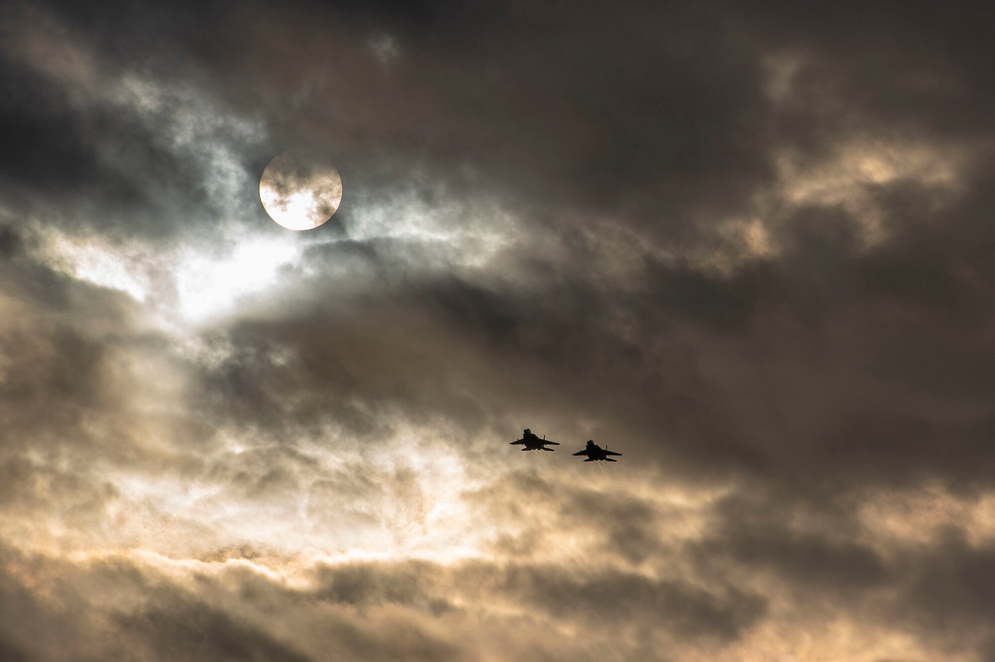 Two F-15E Strike Eagles fly over the flightline at Seymour Johnson Air Force Base, North Carolina, Feb. 10, 2021.
