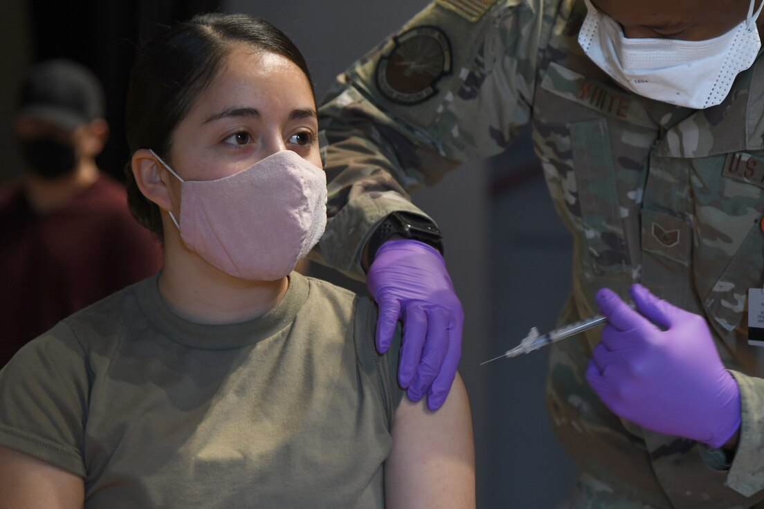 U.S. Air Force Capt. Jasmine Lerma, 355th Medical Group clinical nurse, receives the COVID-19 vaccine at Davis-Monthan Air Force Base, Arizona, Feb. 5, 2021.