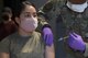 U.S. Air Force Capt. Jasmine Lerma, 355th Medical Group clinical nurse, receives the COVID-19 vaccine at Davis-Monthan Air Force Base, Arizona, Feb. 5, 2021.