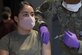 U.S. Air Force Capt. Jasmine Lerma, 355th Medical Group clinical nurse, receives the COVID-19 vaccine at Davis-Monthan Air Force Base, Arizona, Feb. 5, 2021.