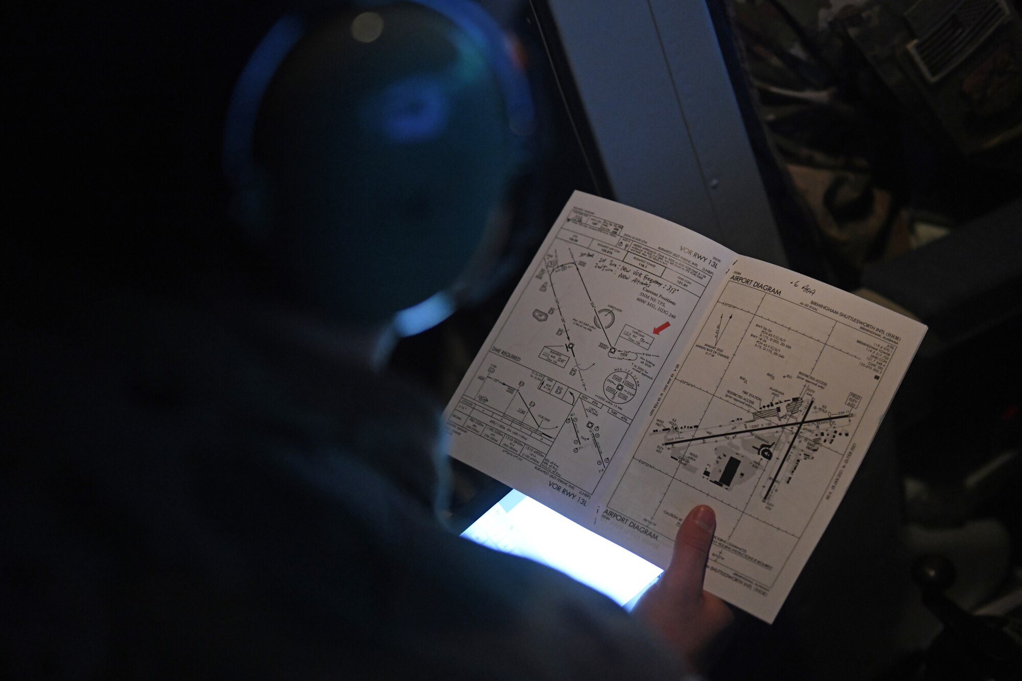 U.S. Air Force Senior Airman Juan Morales, 351st Air Refueling Squadron boom operator, analyzes an airport diagram during the Tanker Heist Competition at Royal Air Force Mildenhall, England, Feb. 11, 2021. Each team had the ability to earn or lose points based on their techniques and success when accomplishing various maneuvers in the simulator. (U.S. Air Force photo by Staff Sgt. Mackenzie Mendez)