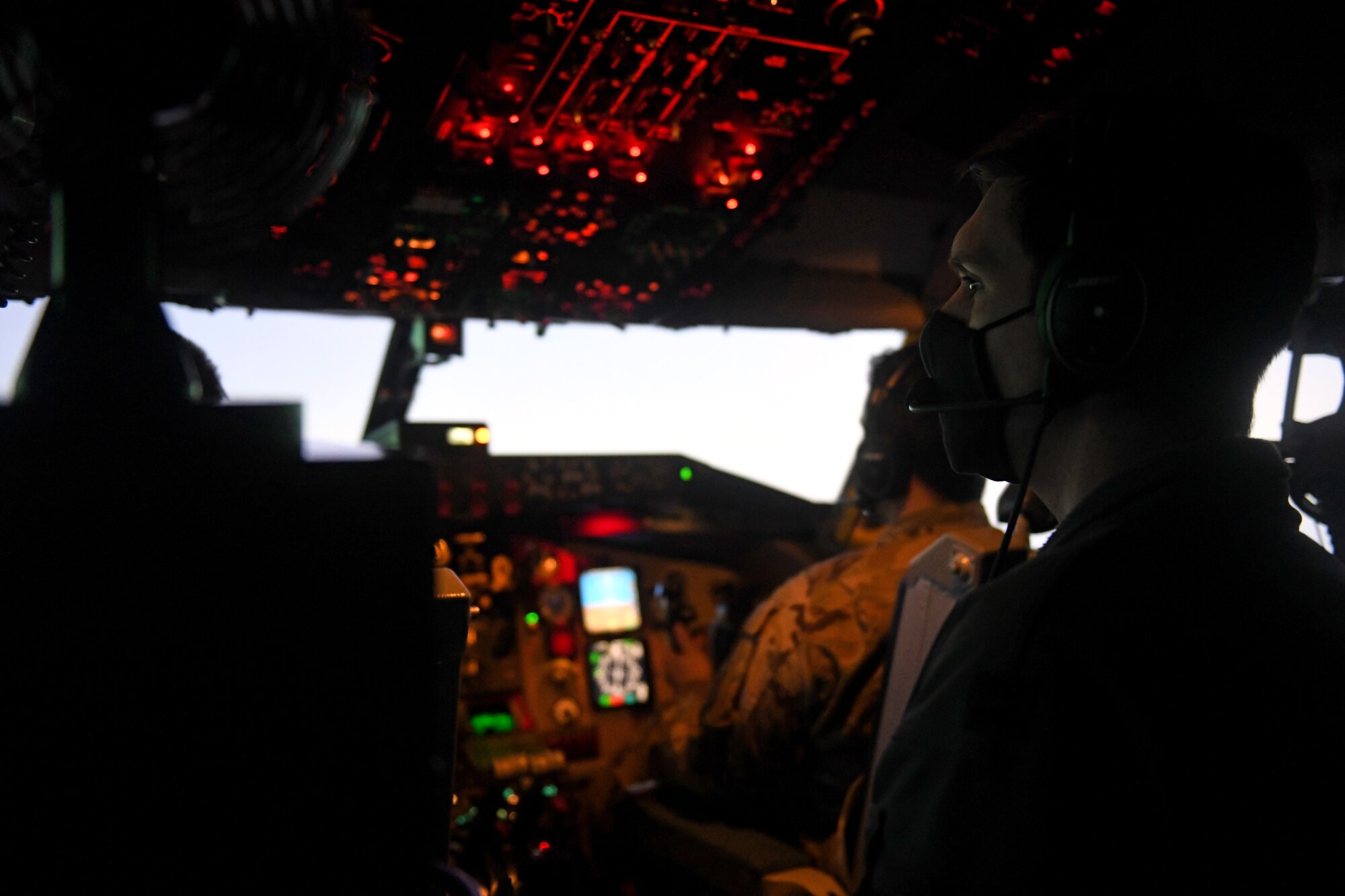 U.S. Air Force Capt. Wilson Spreier, 100th Operations Support Squadron mission planning officer, observes the approach to a simulated landing strip during the Tanker Heist competition at Royal Air Force Mildenhall, England, Feb. 11, 2021. The Tanker Heist simulator profile included 12 evaluated events under six main sections: boom operator flying proficiency, instrument approaches, landings, emergency procedures, aerial refueling and contacts. (U.S. Air Force photo by Staff Sgt. Mackenzie Mendez)