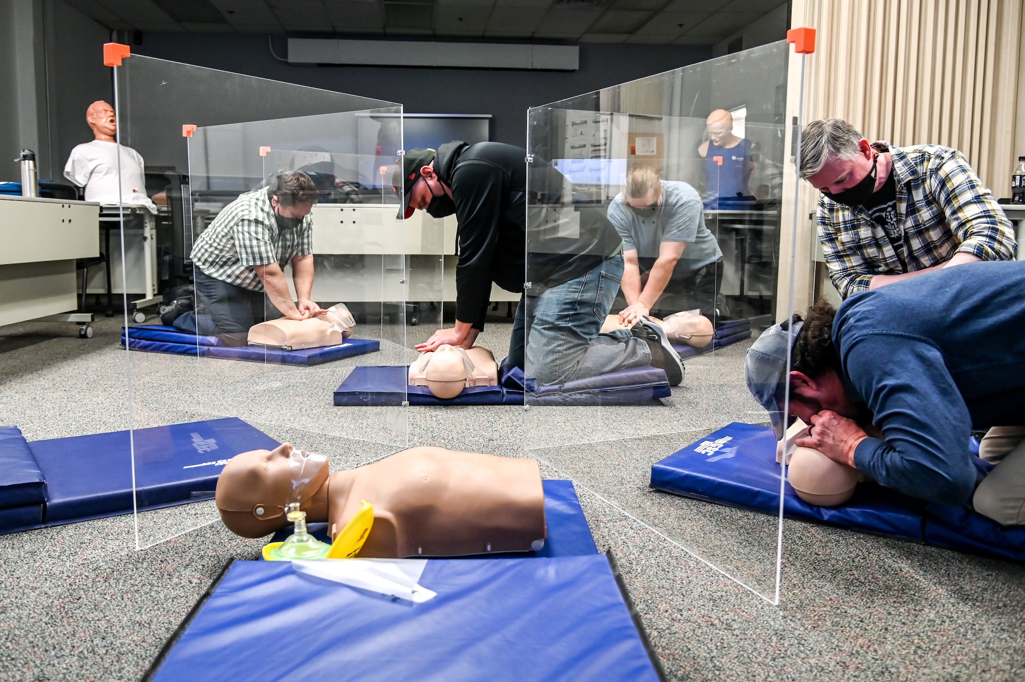 Students practice compressions and rescue breaths in the cardiopulmonary resuscitation, or CPR, class Feb. 8, 2021, at Hill Air Force Base, Utah. The CPR class is one of the several classes still being offered during the pandemic with modifications from 75th Force Support Squadron's Education and Training Center. (U.S. Air Force photo by Cynthia Griggs)