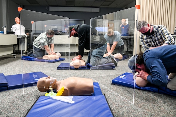 Students practice compressions and rescue breaths in the cardiopulmonary resuscitation, or CPR, class Feb. 8, 2021, at Hill Air Force Base, Utah. The CPR class is one of the several classes still being offered during the pandemic with modifications from 75th Force Support Squadron's Education and Training Center. (U.S. Air Force photo by Cynthia Griggs)