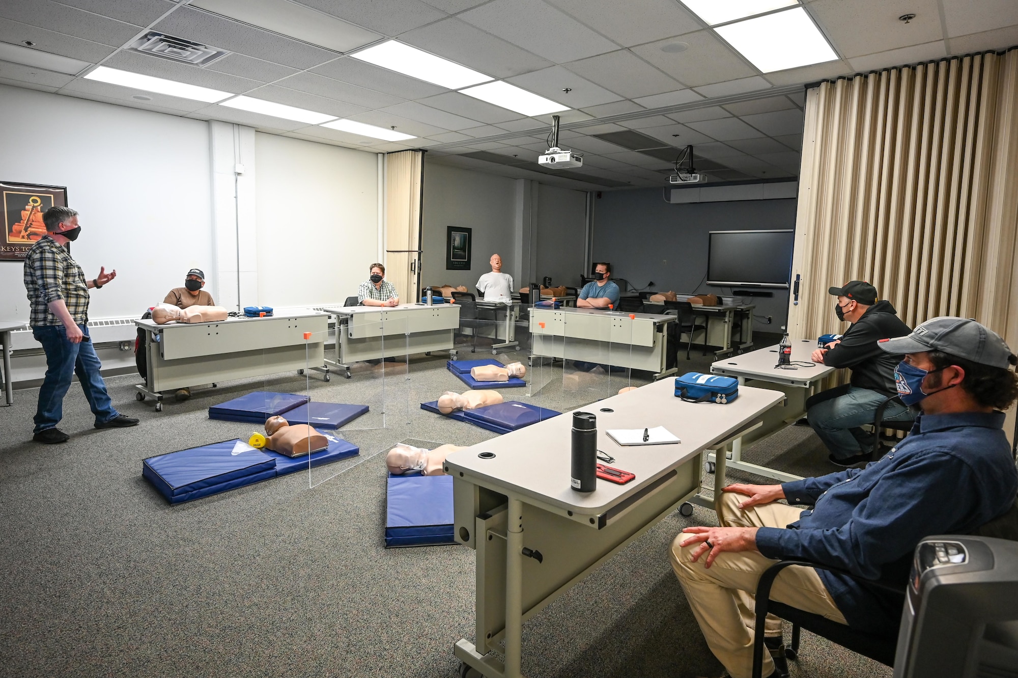Students listen to instructor Jason Bertoldie, 75th Force Support Squadron, in the cardiopulmonary resuscitation, or CPR, class Feb. 8, 2021, at Hill Air Force Base, Utah. The CPR class is one of the several classes still being offered during the pandemic with modifications from 75th FSS’s Education and Training Center. (U.S. Air Force photo by Cynthia Griggs)