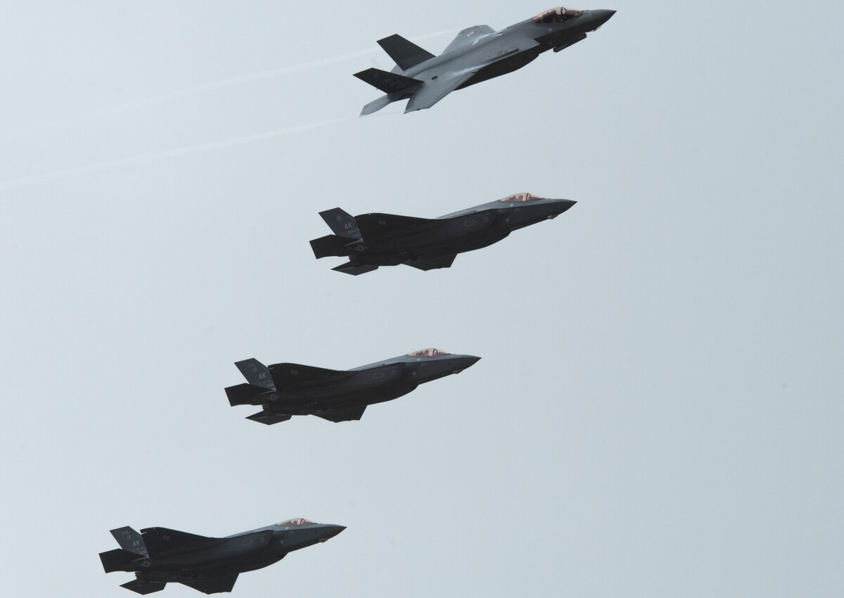 Four U.S. Air Force F-35A Lightning II assigned to the 356th Fighter Squadron at Eielson Air Force Base, Alaska, fly in formation over Andersen AFB, Guam, as part of Cope North 21 Feb. 6, 2021. Cope North is an annual multinational exercise designed to increase capabilities and improve interoperability among partner nations, and this year’s exercise focuses on humanitarian assistance and disaster relief operations, large force employment and combat air forces training, and this is the F-35A’s first year participating in Cope North. (U.S. Air Force photo by Senior Airman Jonathan Valdes Montijo)
