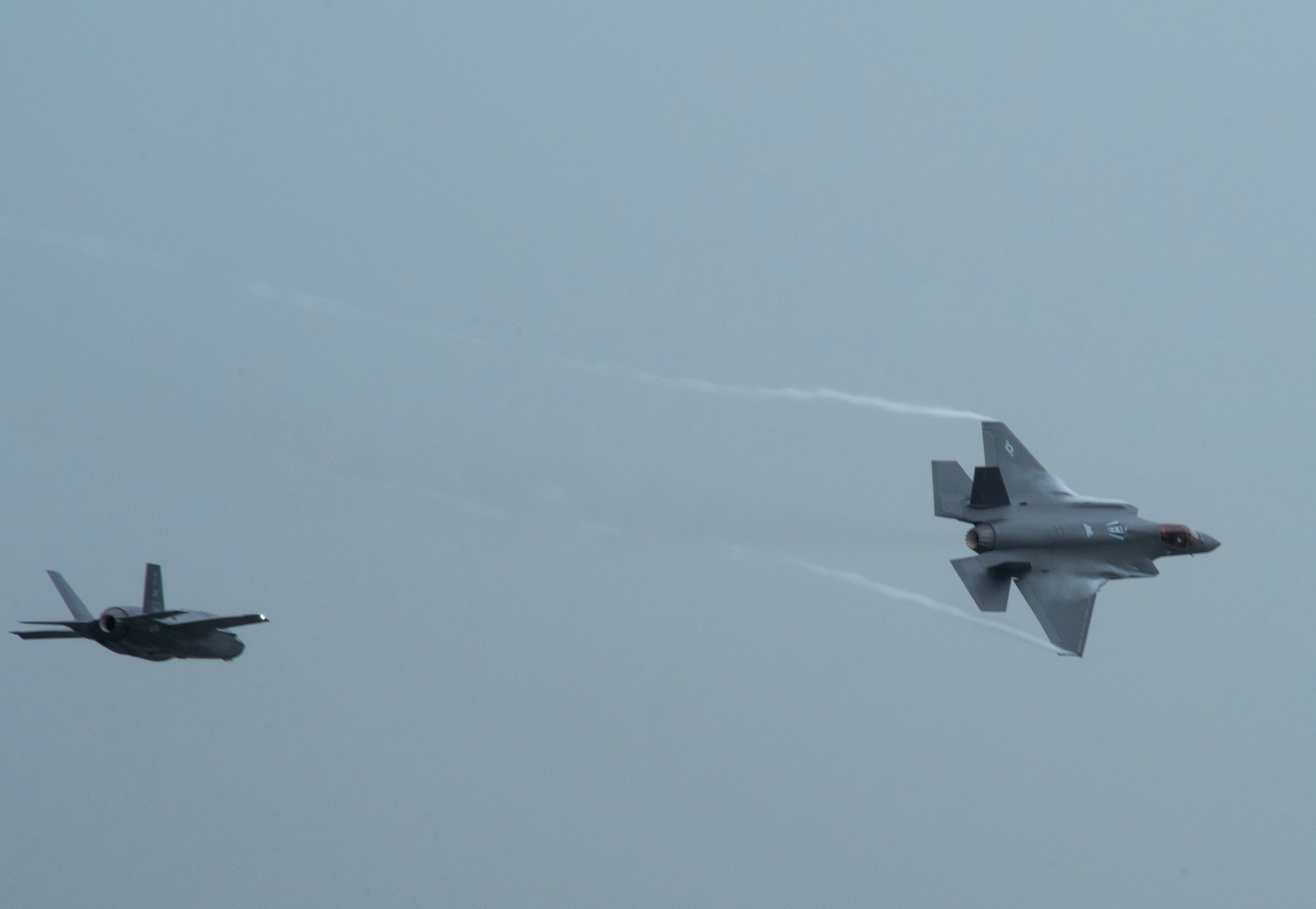 Two U.S. Air Force F-35A Lightning II assigned to the 356th Fighter Squadron at Eielson Air Force Base, Alaska, fly over Andersen AFB, Guam, as part of Cope North 21 Feb. 6, 2021. Approximately 2,200 personnel and 97 aircraft were brought together for Cope North 21 with the mission to improve combat readiness, increase interoperability between U.S. Air Force, Royal Australian Air Force and Japan Air Self-Defense Force, or Koku-Jieitai. (U.S. Air Force photo by Senior Airman Jonathan Valdes Montijo)