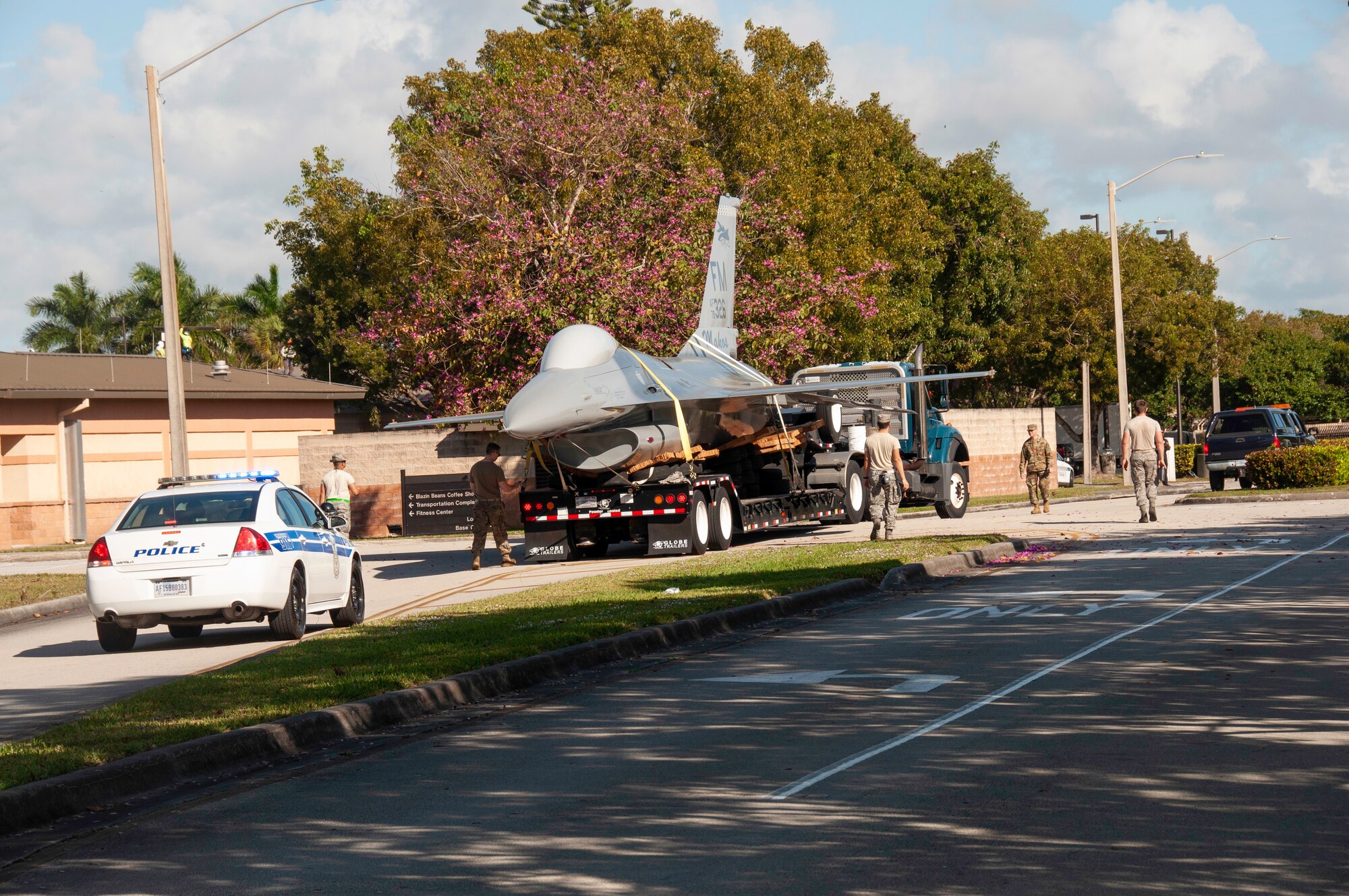 Members of the 482nd Maintenance Group, Homestead Air Reserve Base, Fla., transport an F-16C to be reinstalled on its “perch” after giving it a full corrosion control update and a shiny new paint job on February 10, 2021.