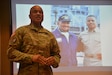 Chief Warrant Officer 5 Phillip Brashear, 80th Training Command, speaks about his father, the late Navy Master Chief Petty Officer Carl Brashear. Phillip was featured as the guest speaker for the installation’s African American/Black History Month command program.