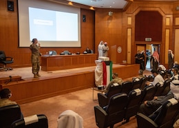 Cpt. Emrick Whitfield, veterinary clinic officer in charge, Area Support Group Kuwait, answers questions during a canine behavior and safety seminar at the Public Authority of Agriculture Affairs and Fish Resources hosted by ASG Kuwait in Rabia, Kuwait, Feb. 2, 2021. The attendees for the class were a mixture of shelter volunteers and dog owners.