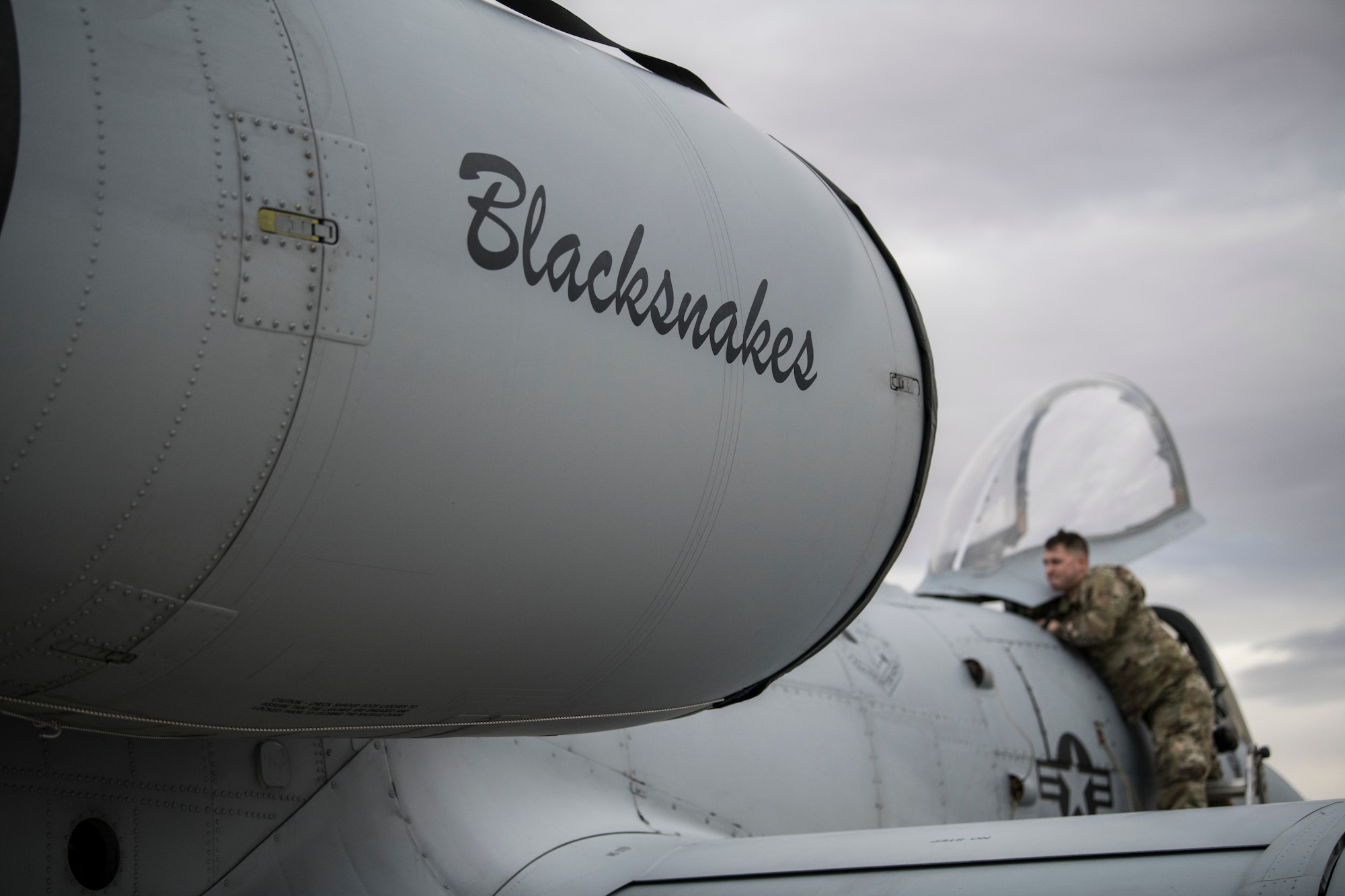 A U.S. Airman with the Indiana Air National Guard, assigned to the 122nd Fighter Wing, Fort Wayne, Indiana, works on an A-10C Thunderbolt II aircraft during Red Flag 21-1, at Nellis Air Force Base, Nevada, Jan. 19, 2021. The event, held several times per year, is a U.S. Air Force premier air-to-air combat training exercise. (U.S. Air National Guard photo by Staff Sgt. Justin Andras)