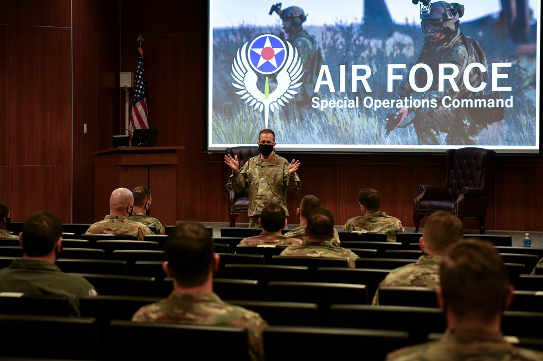 Photo of Lt. Gen. Jim Slife briefing a room of Airmen