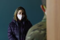 Ms. Cheryl Ulmer, regional director for U.S. Senator Jon Tester, speaks with Lt. Col. Kevin Weaver, 40th Helicopter Squadron commander Feb. 18, 2021, at Malmstrom Air Force Base, Mont.