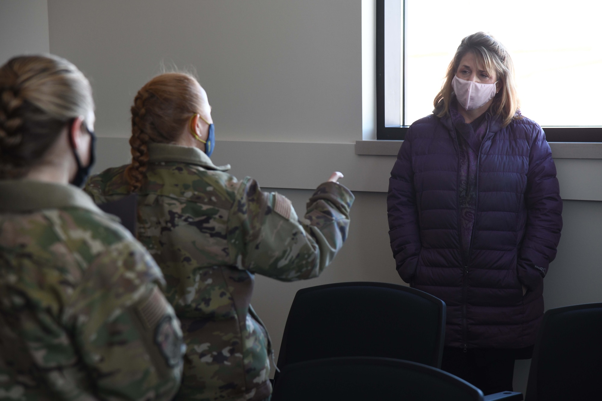 Ms. Cheryl Ulmer, regional director for U.S. Senator Jon Tester (front), speaks with Col. Anita Feugate Opperman (right), 341st Missile Wing commander, and Lt. Col. Michelle Sterling (left), 341st Civil Engineering Squadron commander, Feb. 18, 2021, at Malmstrom Air Force Base, Mont.
