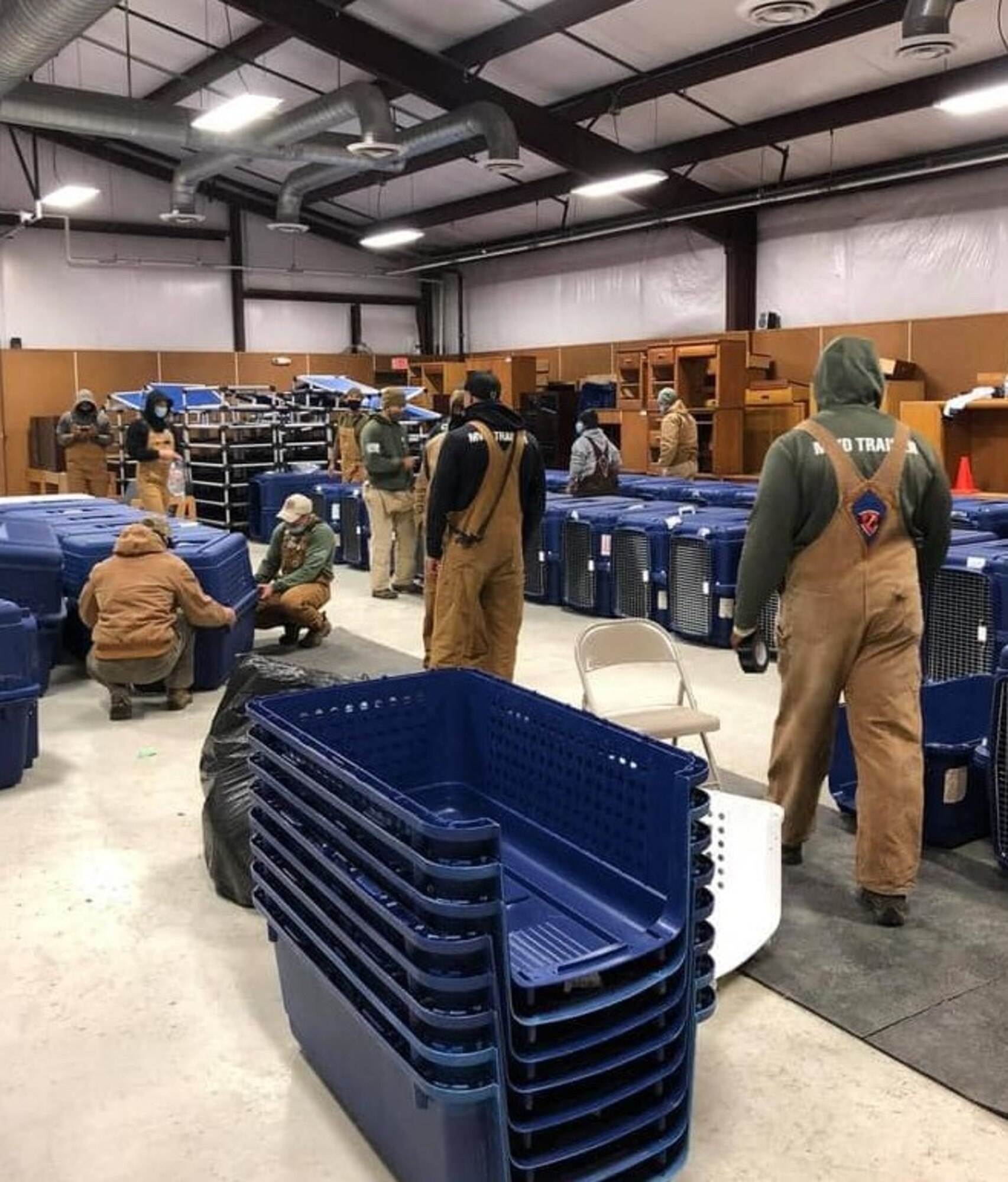 Teams put together crates, moved food, set up walking tracks and provided food and drinks in order to get four-legged warriors indoors in anticipation of this week’s cold conditions at Joint Base San Antonio, Texas.