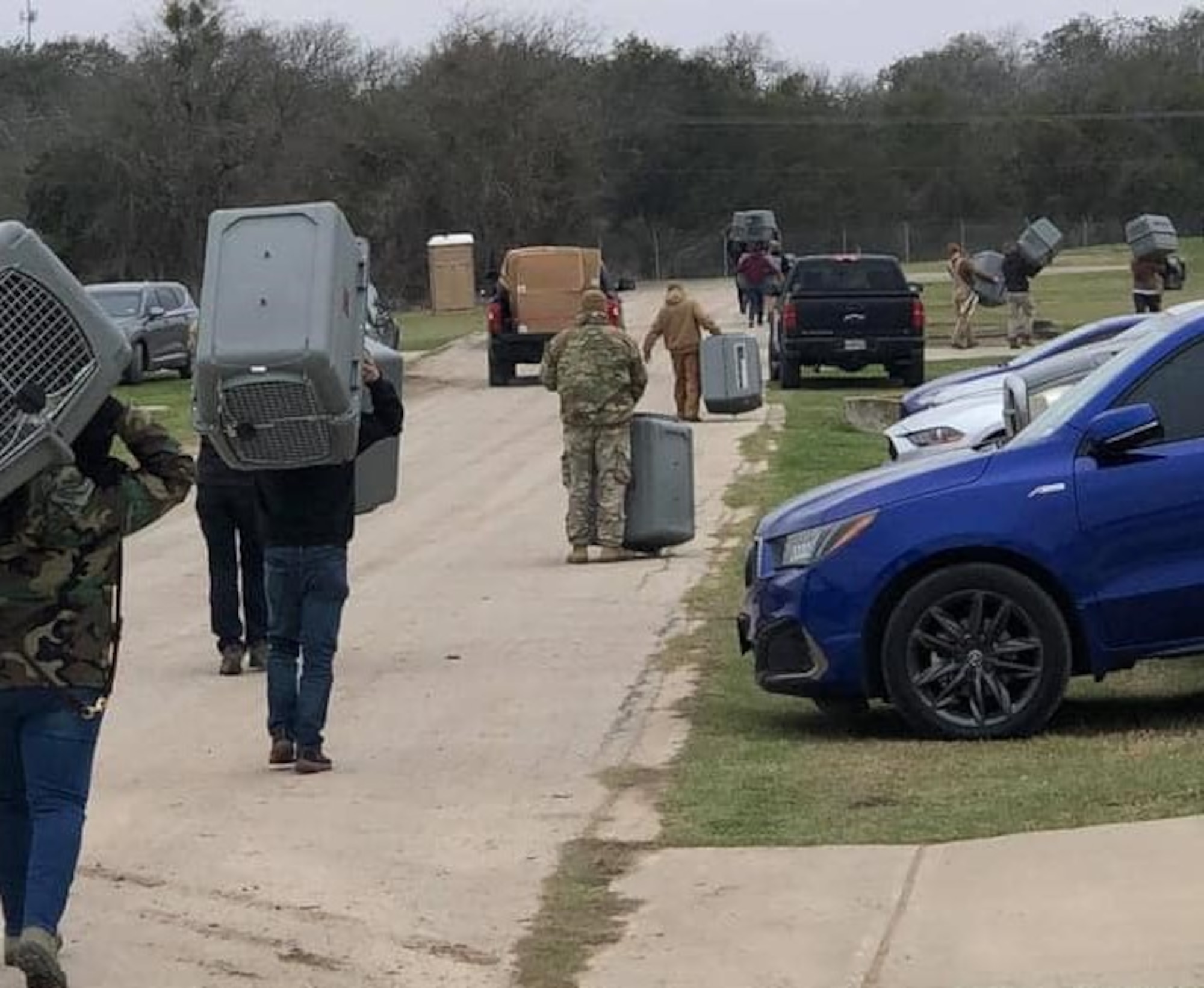 The Warhawk Nation, 341st Military Working Dog Training Squadron, came together to protect their own Feb. 13, transporting 804 military working dogs indoors in preparation for severe winter weather in the Alamo Region.