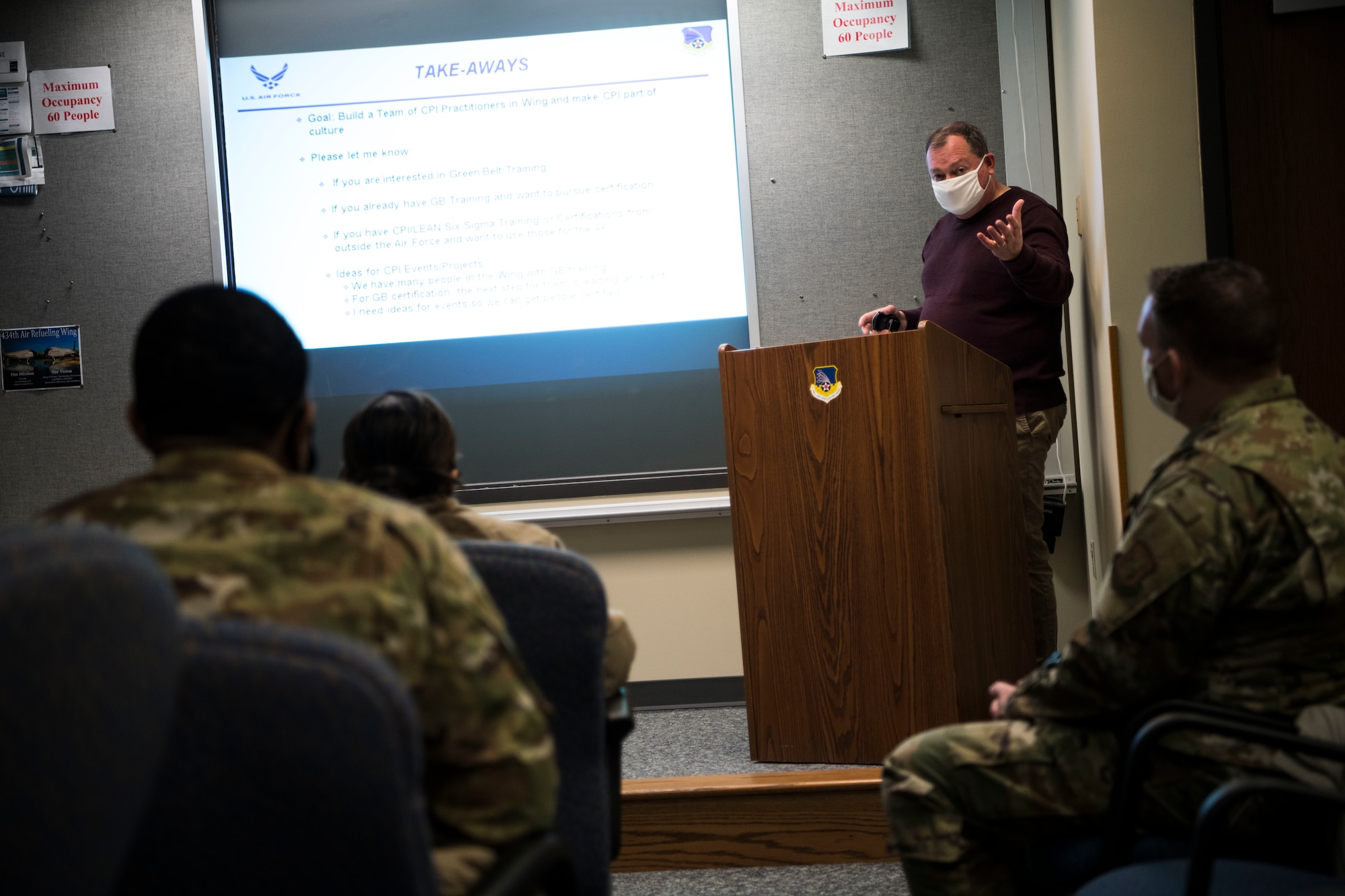 Bryan Runion, 434 Air Refueling Wing Process Improvement manager, speaks with base personnel during a brief pertaining Continuous Process Improvement, February 6, 2021, at Grissom Air Force Base, Indiana. The purpose of the brief was to educate Air Force members about the CPI course that's available. ( U.S. Air Force photo by Staff Sgt. Alexa Culbert)