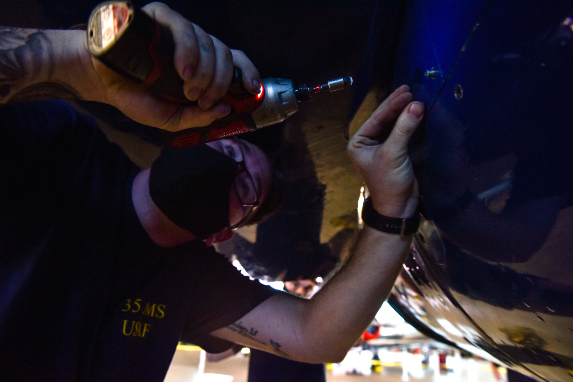 U.S. Air Force Senior Airman Nicholas Bell, 735th Air Mobility Squadron communications navigation specialist, tightens a screw onto a U.S. Navy Blue Angel F/A-18 on Joint Base Pearl Harbor-Hickam, Hawaii, Feb. 9, 2021.  The Pearl Harbor Aviation Museum’s mission is to steward America’s first aviation battlefield of World War II – sharing the artifacts, personal stories, the impact and response to the attack on December 7, 1941, and the Pacific region battles that followed.

(U.S. Air Force photo by Tech. Sgt. Anthony Nelson Jr.)