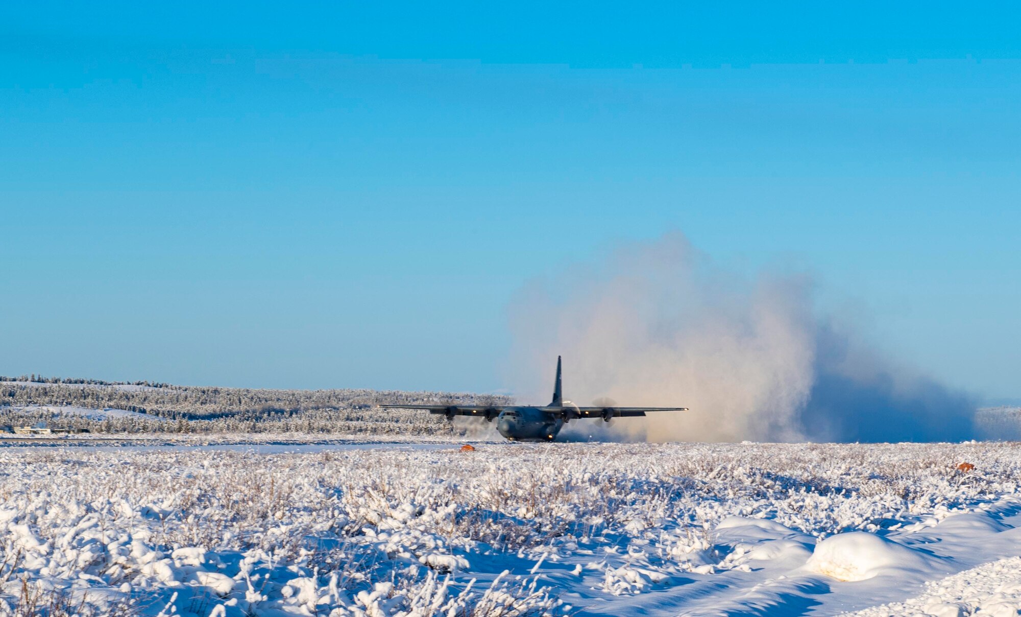 U.S. Air Force Capt. Jacob Lambert, 36th Airlift Squadron pilot, lands a C-130J Super Hercules at Donnelly Training Area, AK, during exercise Arctic Warrior 21, Feb. 8, 2021.