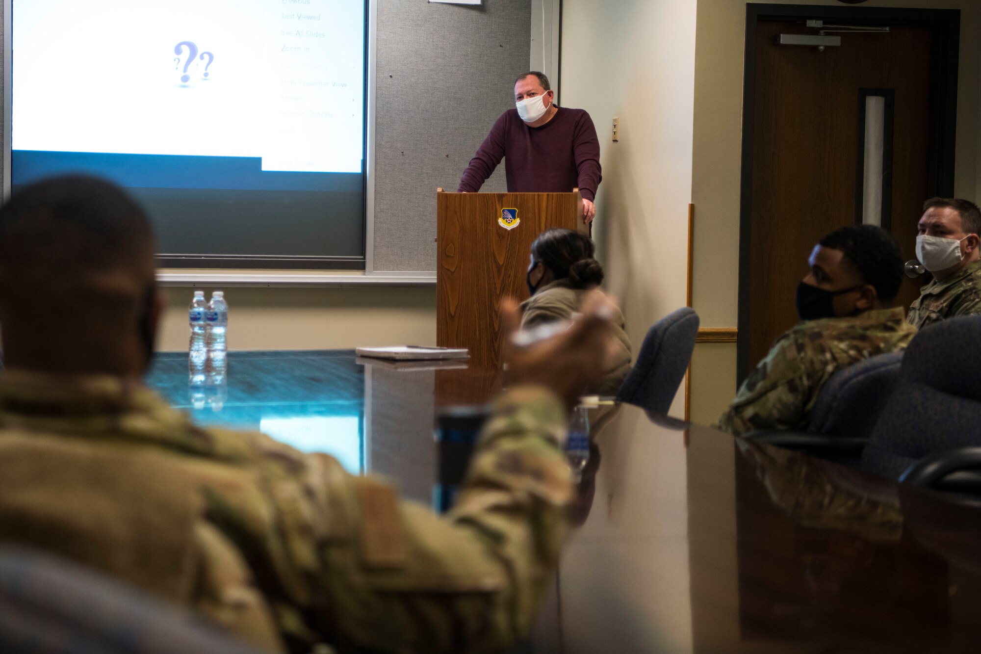 Bryan Runion, 434 Air Refueling Wing Process Improvement manager, speaks with base personnel during a brief pertaining Continuous Process Improvement, February 6, 2021, at Grissom Air Force Base, Indiana. The purpose of the brief was to educate Air Force members about the CPI course that's available. ( U.S. Air Force photo by Staff Sgt. Alexa Culbert)