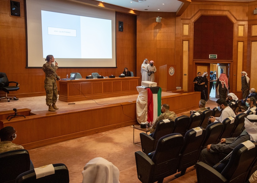 Cpt. Emrick Whitfield, veterinary clinic officer in charge, Area Support Group Kuwait, answers questions during a canine behavior and safety seminar at the Public Authority of Agriculture Affairs and Fish Resources hosted by ASG Kuwait in Rabia, Kuwait, Feb. 2, 2021. The attendees for the class were a mixture of shelter volunteers and dog owners.