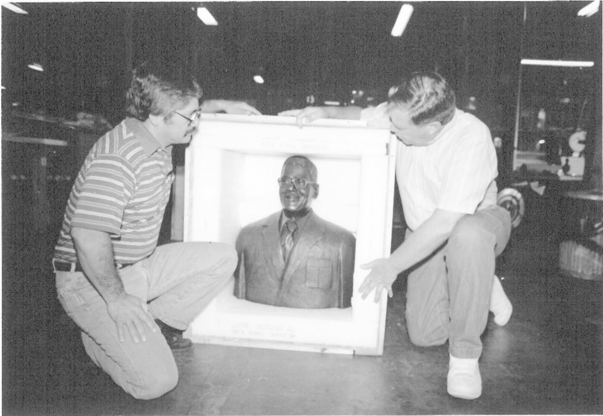 Photo of Wilber Miller’s bust, sculpted by Emilio Torres, being unpacked before placement at the Kelly Veteran’s Memorial Park, “Ring of Honor” at Kelly Air Force Base, which is now Port San Antonio. (Courtesy photo)