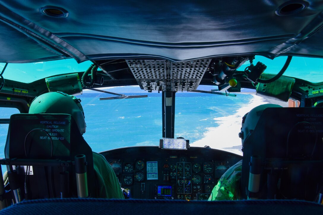 Two Pilots in UH1N Cockpit