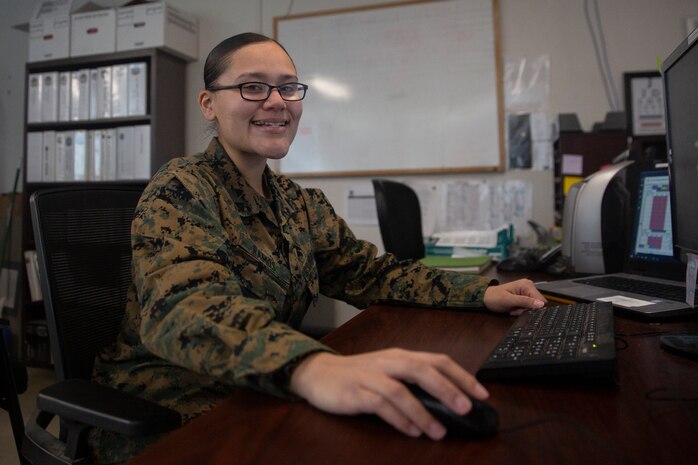 Lance Cpl. Destiny Ramos, an aviation operations chief with Marine Light Attack Helicopter Squadron 269 poses for a photo on Marine Corps Air Station New River, N.C., January 29, 2021. “An enemy who puts obstacles in front of you to see to it that you fall, while a leader teaches you to walk when you only knew how to crawl,” said Ramos, a Leesburg, Fla. native. According to her leadership, Ramos’ professionalism, maturity, and motivation has made her stand out among her peers. Ramos is proficient is her primary military occupation specialty as an aviation operations specialist and recently was appointed as the squadrons aviation operations chief, which is normally occupied by a staff sergeant. (U.S. Marine Corps photo by Lance Cpl. Yuritzy Gomez)