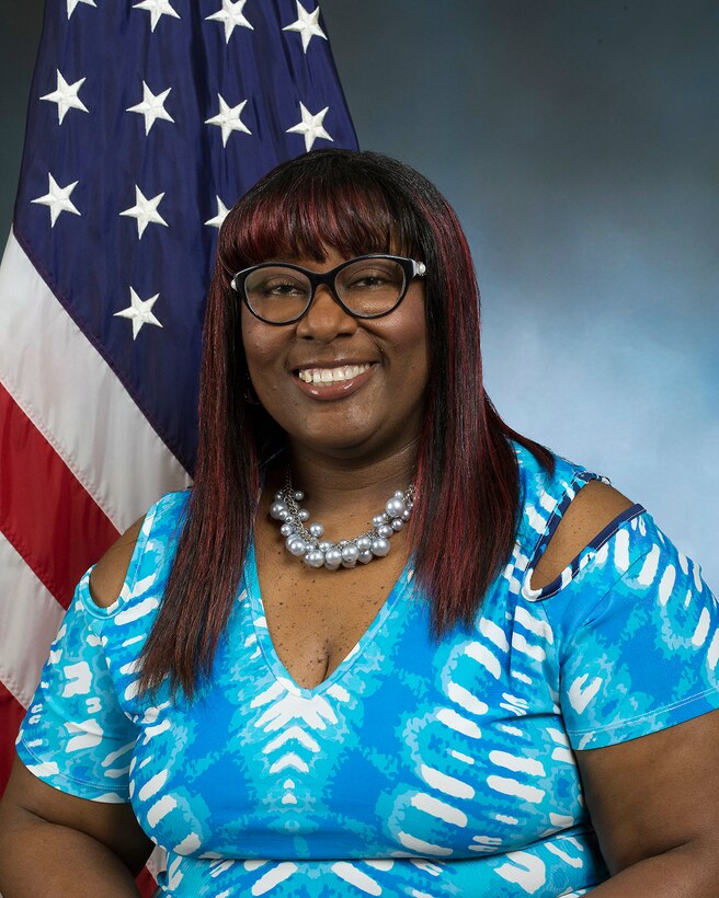 official photo with American flag and blue background